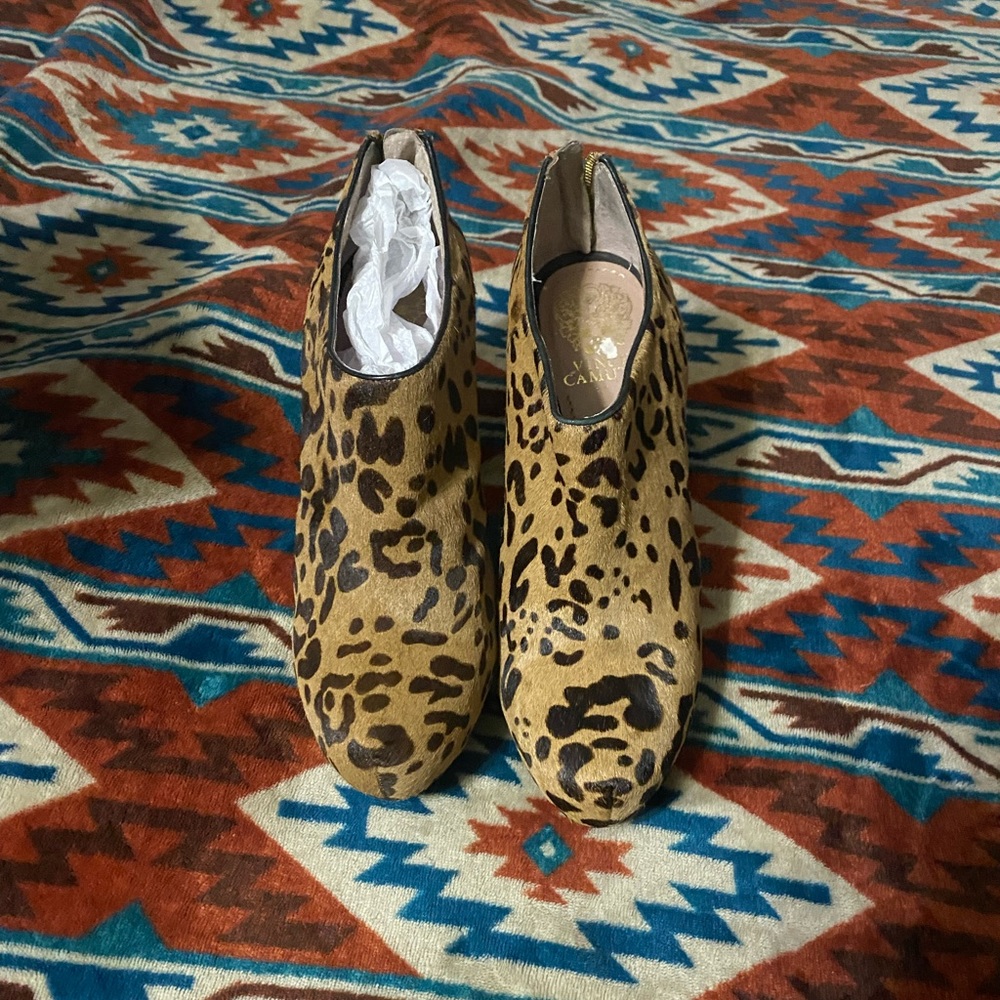 Vince Camuto. Hide on hair booties. Size 9. Fits 8.5 better. Great condition!